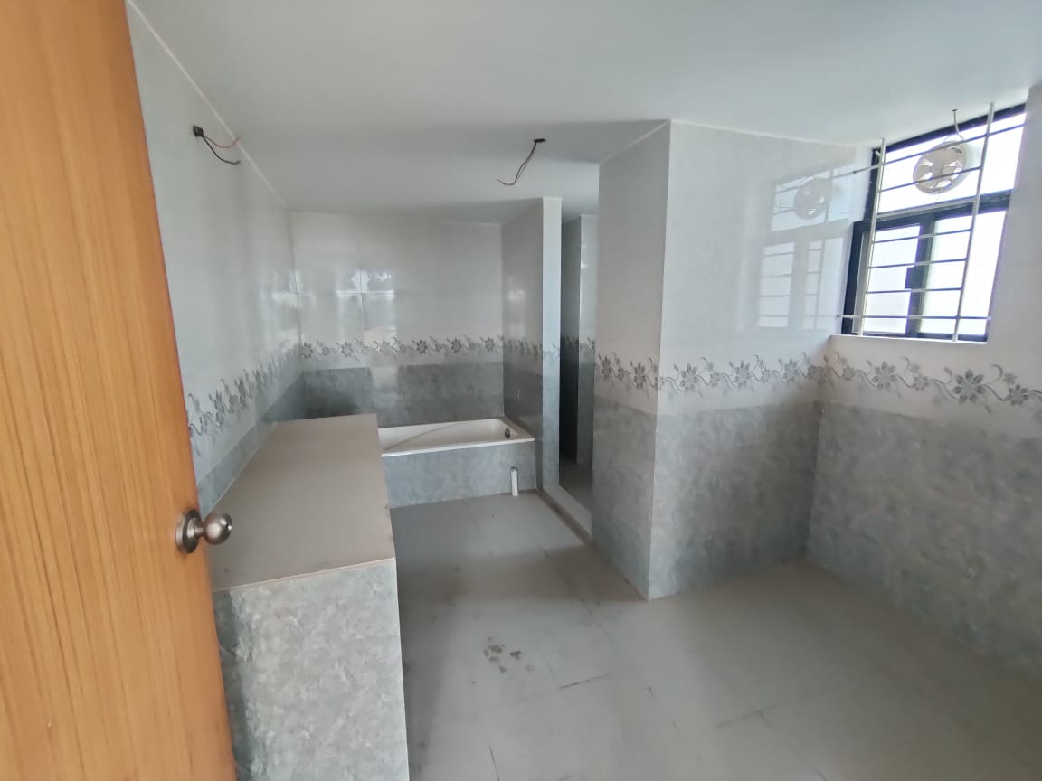 South-facing luxury apartment for sale in Bashundhara 5600 square feet apartment Bashundhara Dhaka Premium kitchen with cabinetry in 4 bed flat Bashundhara Spacious living and dining area in 9th floor apartment